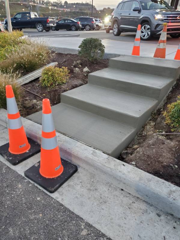 New concrete steps and curb at a retail parking lot in Allegheny County, PA