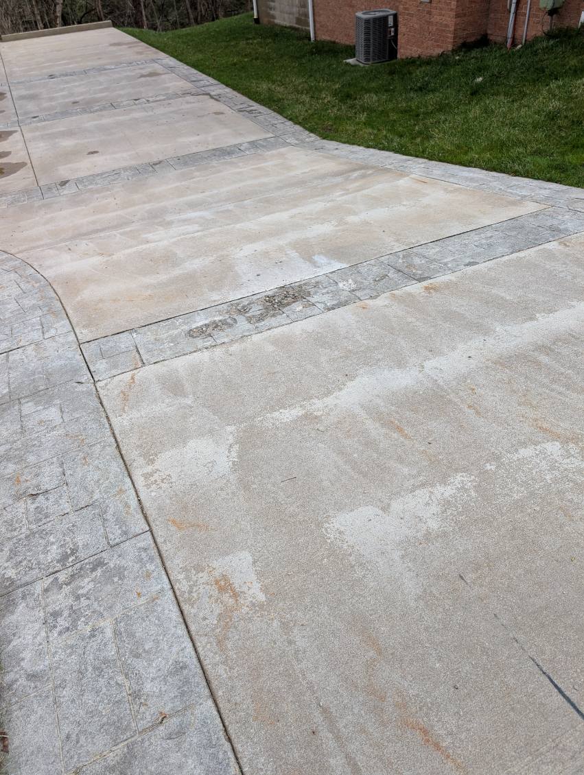 Concrete driveway with stamped ashlar accent bands near Gibsonia, PA